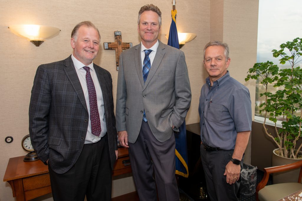 Tuckerman Babcock, Governor Mike Dunleavy, and Ben Stevens. 